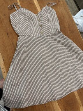 Francesca’s Beige and White Striped Mini Dress with Button-Front Bodice